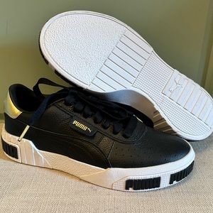 Puma women’s sneakers. Black and gold BNWOT